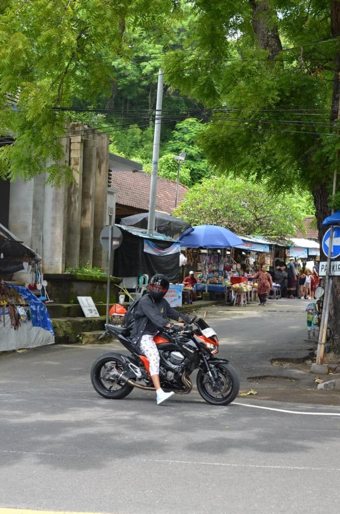 Premium motorcycle tour through traditional Balinese streets in Denpasar