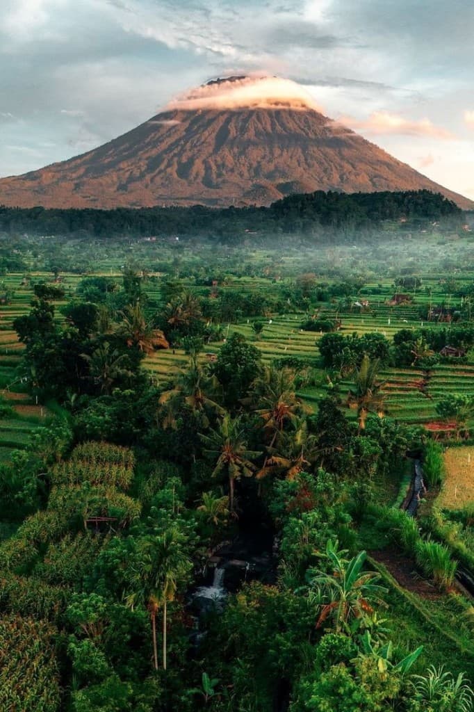 Scenic mountain roads and lush rice terraces near Jatiluwih with Mount Agung, Bali